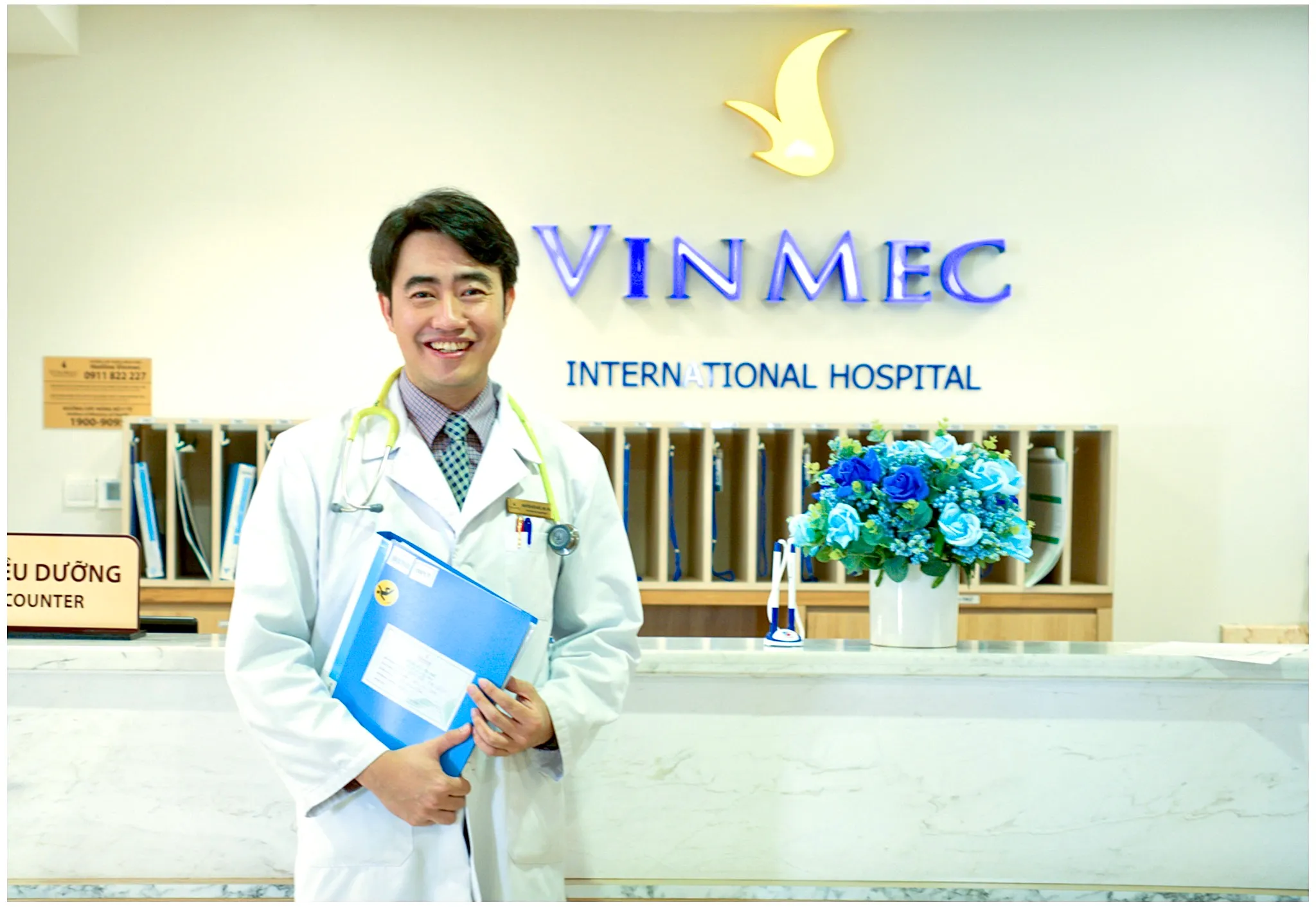 Dr. Nguyen Huu Duc in a white coat